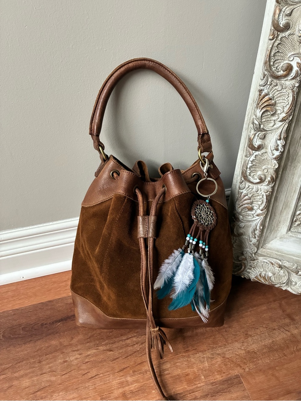 Anabaglish suede leather bucket bag with dreamcatcher charm